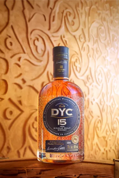 A bottle of DYC whiskey