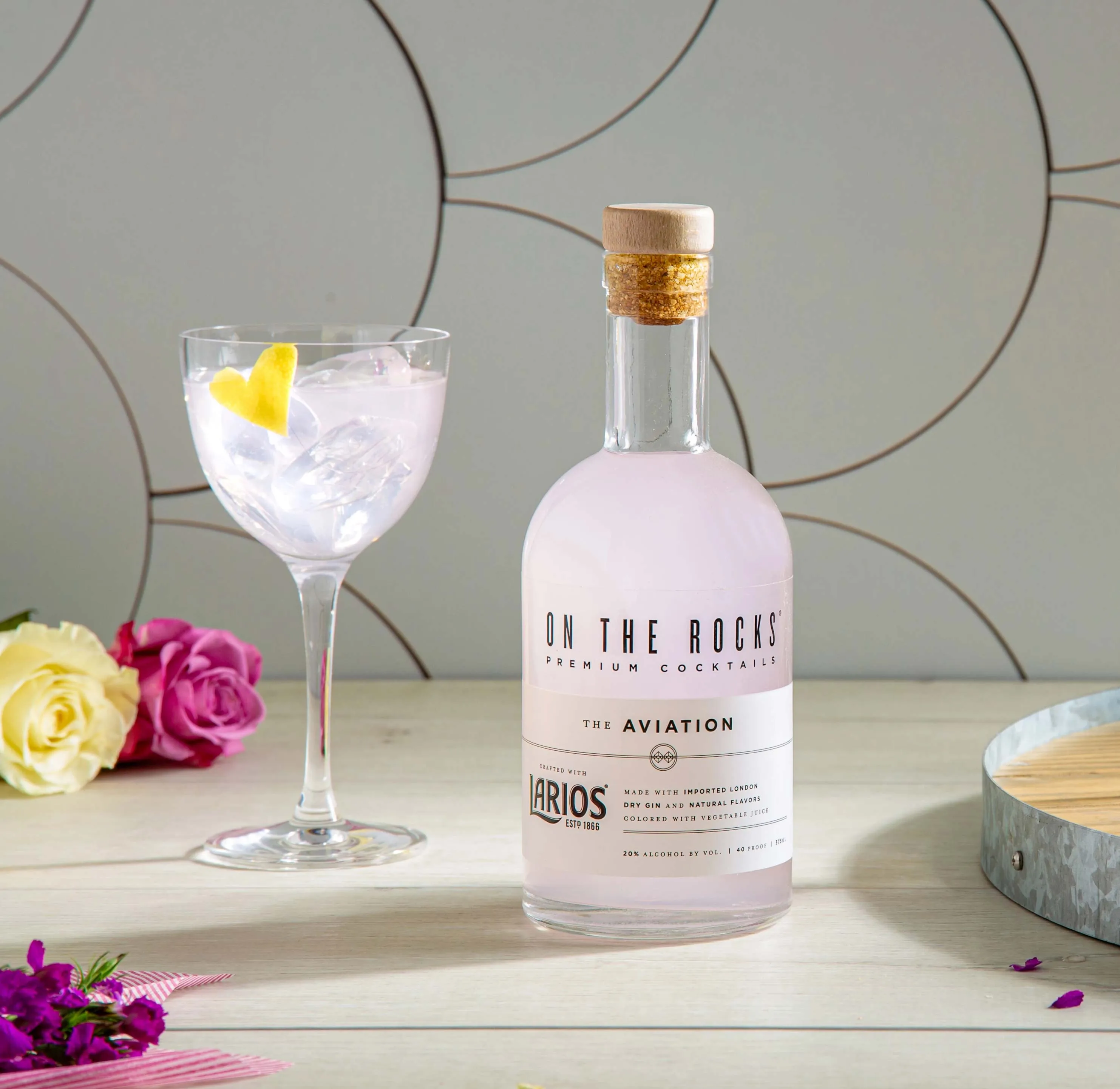 A bottle and a glass of On the Rocks pre-mixed cocktail