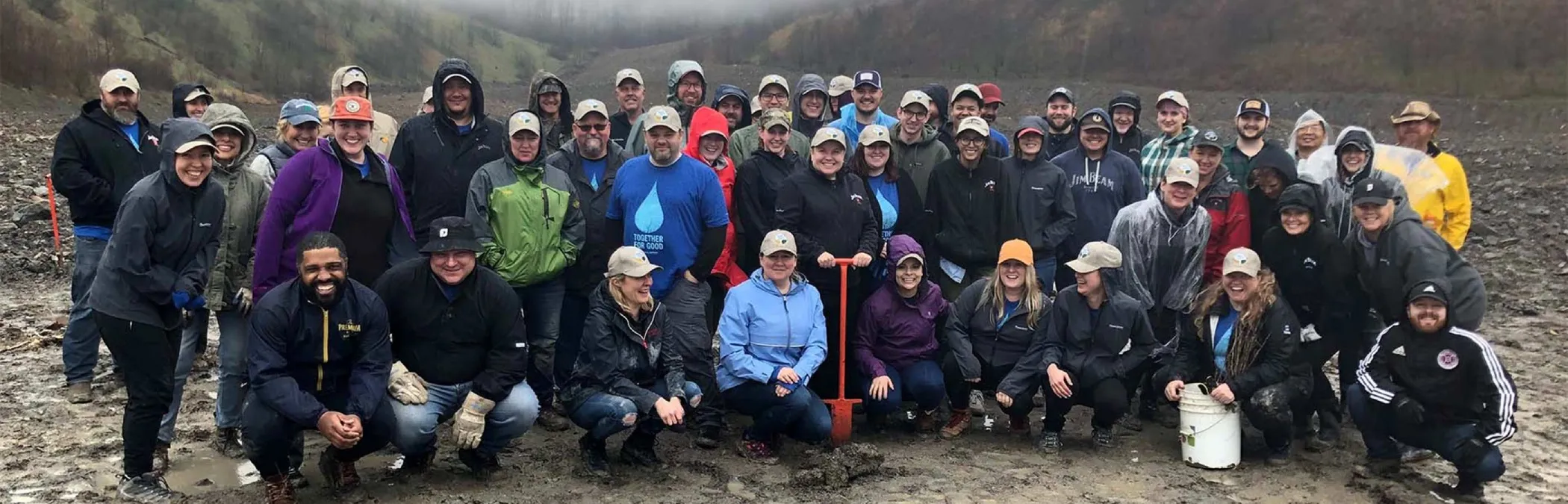 beam Suntory employees gathered together for a photo on site of a community service event